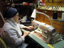 Master tailor Basima Bagdady learned to sew by making her own coat at the tender age of ten. She now delights customers with high quality and reasonable prices at her shop in Fairfield, CT.