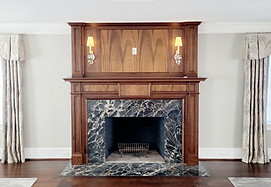 Granite fireplace surround created by granite fabricator Pistritto Marble Imports in Hartford, Connecticut