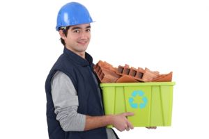 Workman hauling junk